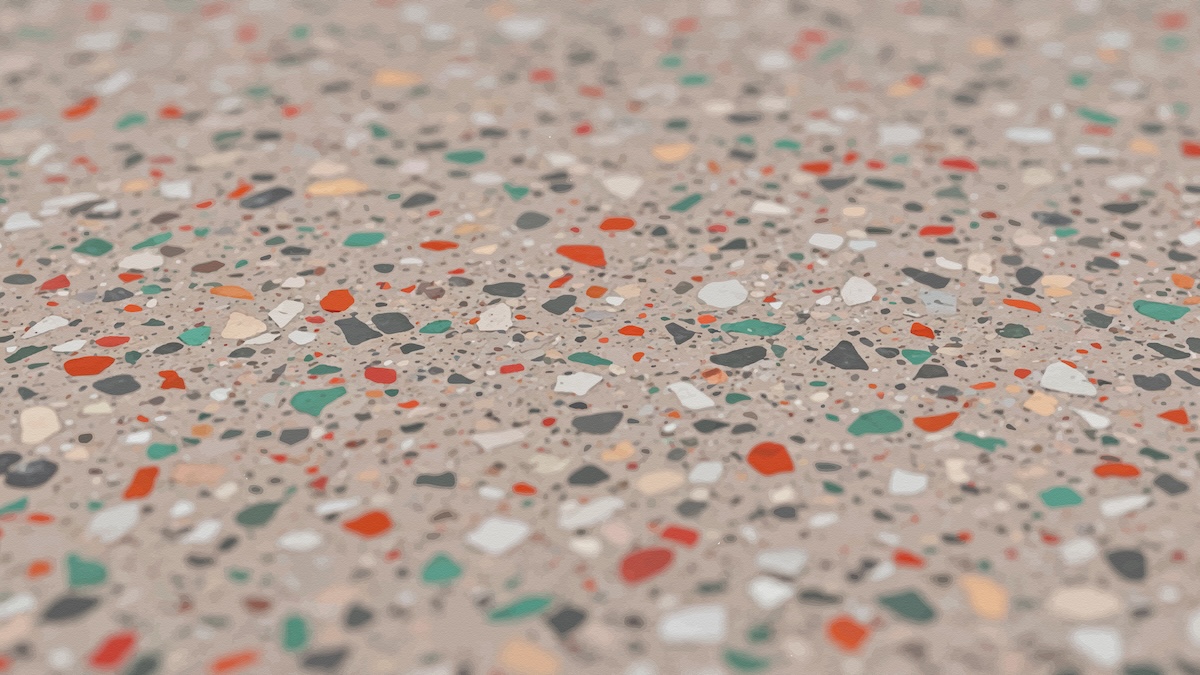 Close up of a terrazzo flooring texture with colorful stone fragments