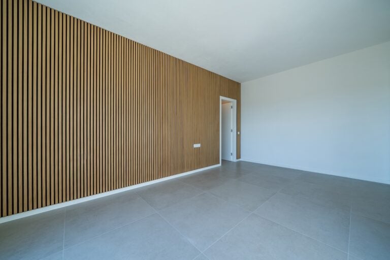 Room with wooden wall texture with wood acoustic panels pattern