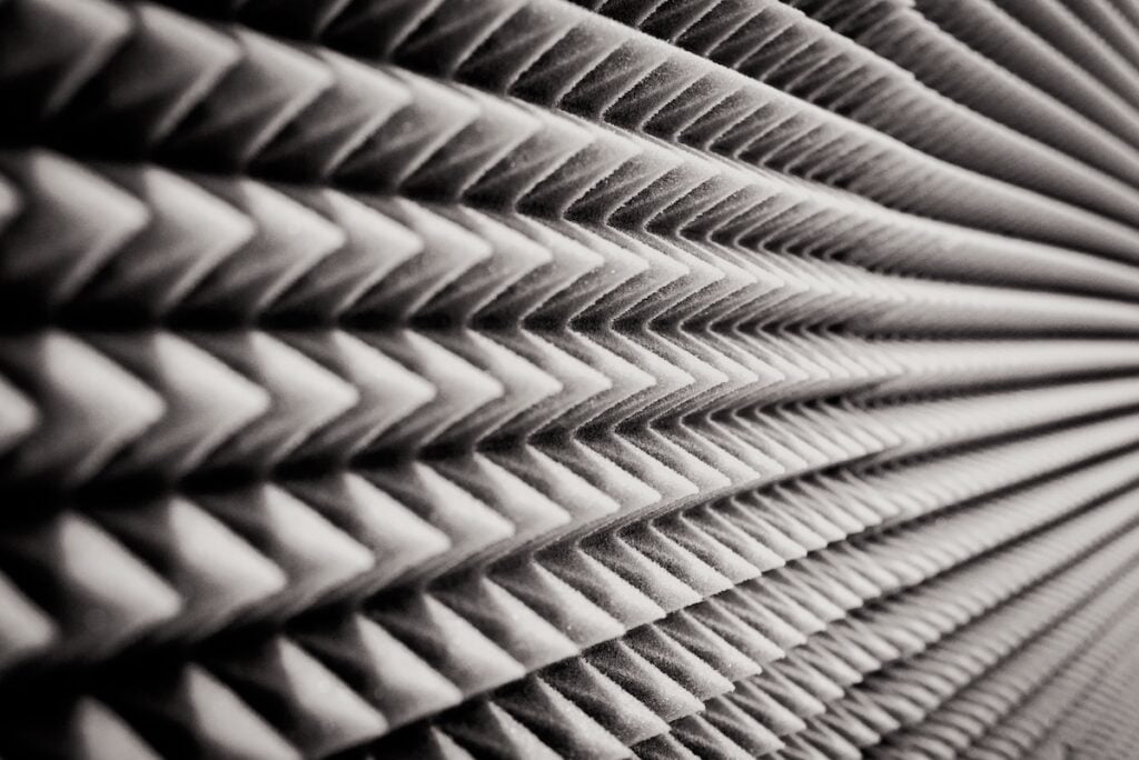 close up Sound Absorption, noise reduction texture in recorder room ,with light flare. how to soundproof a room from outside noise