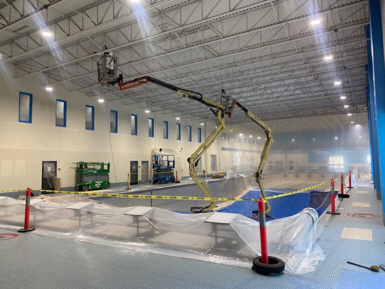 Mclean worker painting commercial space