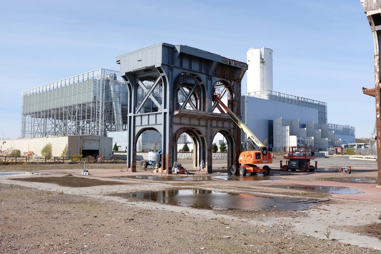 Industrial site painting with construction equipment