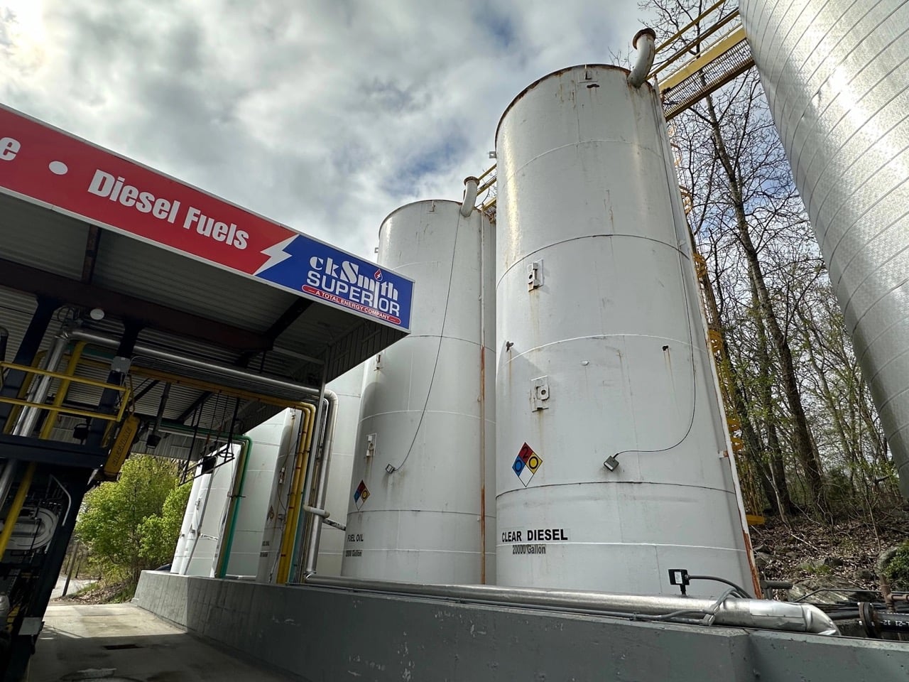 Mclean industrial painted Diesel fuel storage tanks at facility