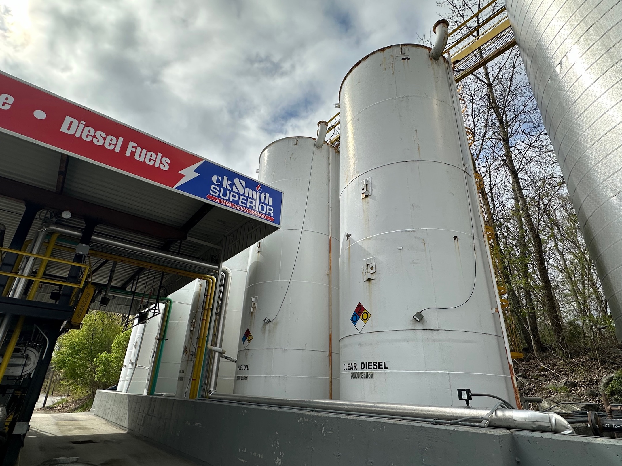 Mclean industrial painted Diesel fuel storage tanks at facility