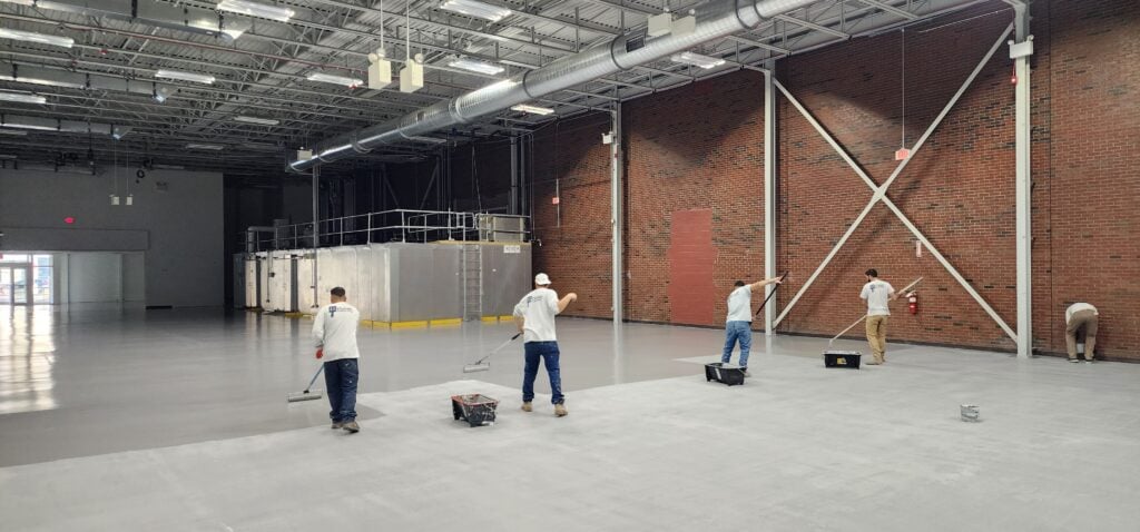 industrial flooring ideas McLean project workers applying coating