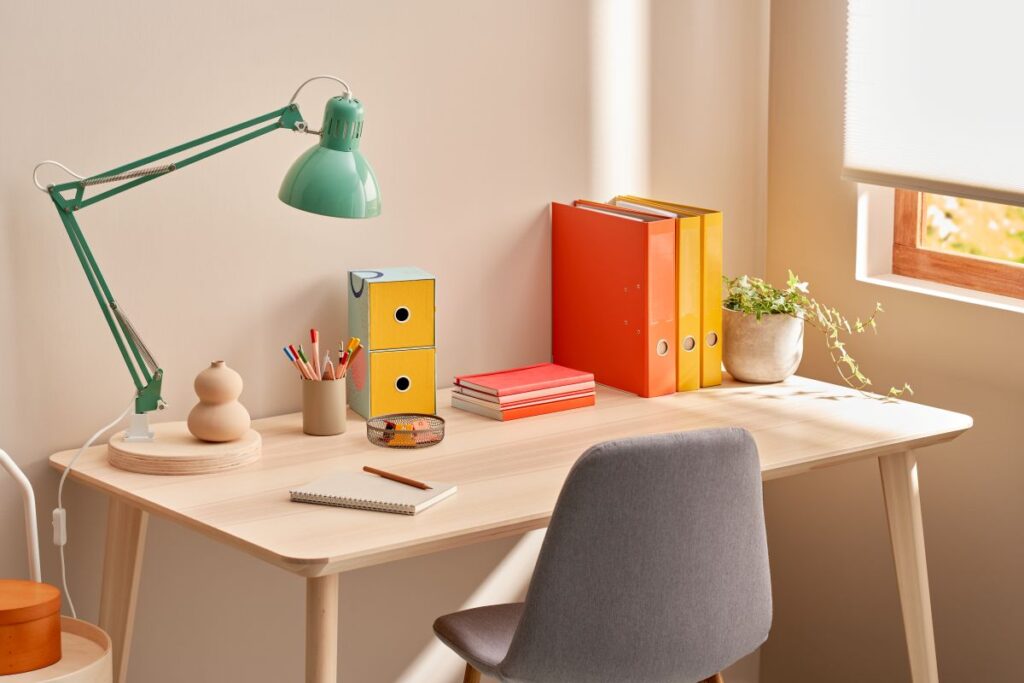 best office colors books on top of desk