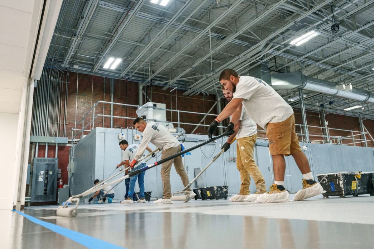 slip resistance treatment McLean workers applying coat