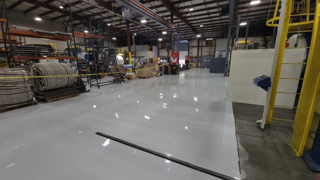 concrete epoxy floor grey floor inside a factory
