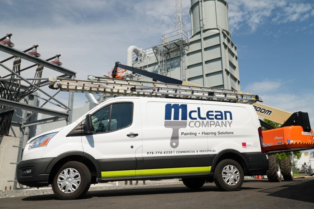 commercial pressure washing truck parked outside building