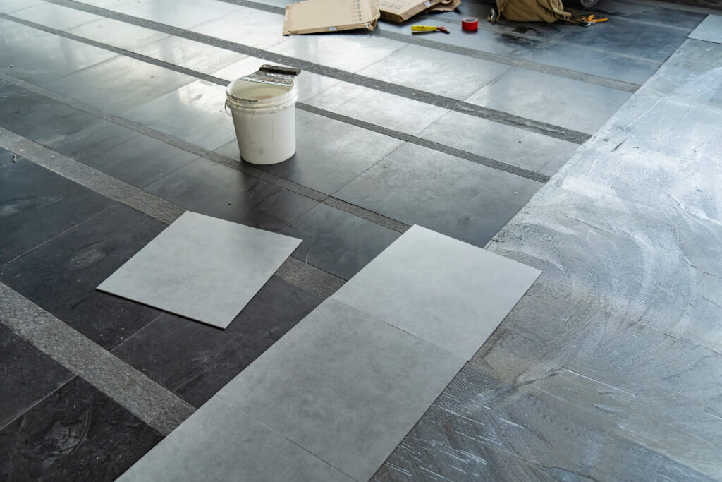 ESD flooring Laying of linoleum or polymer vinyl sheet set for floor. PVC material, Plastic tile set.