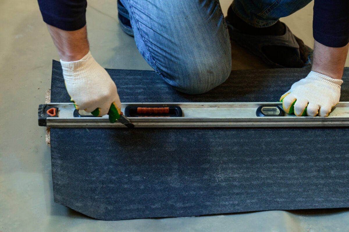 moisture vapor barrier flooring Material for waterproofing, measuring and cutting roofing tape for protection against moisture, repair tools.