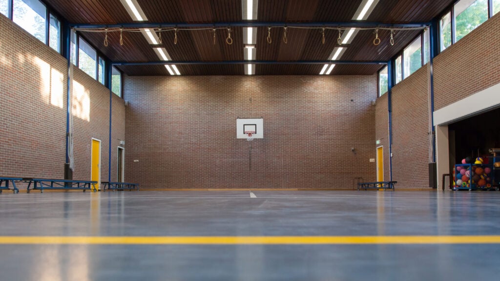 sports hall flooring Interior of a gym at school, old gym in Holland