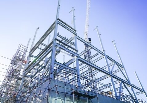 Steel,Framing,And,Beams,Structural,Elements,For,New,Building,Against